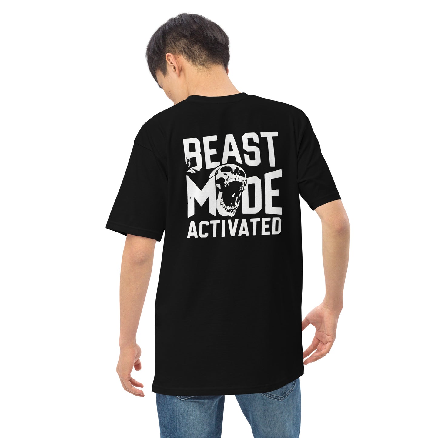 Man wearing Beast Mode Activated men’s premium heavyweight tee in black, showing back graphic design.
