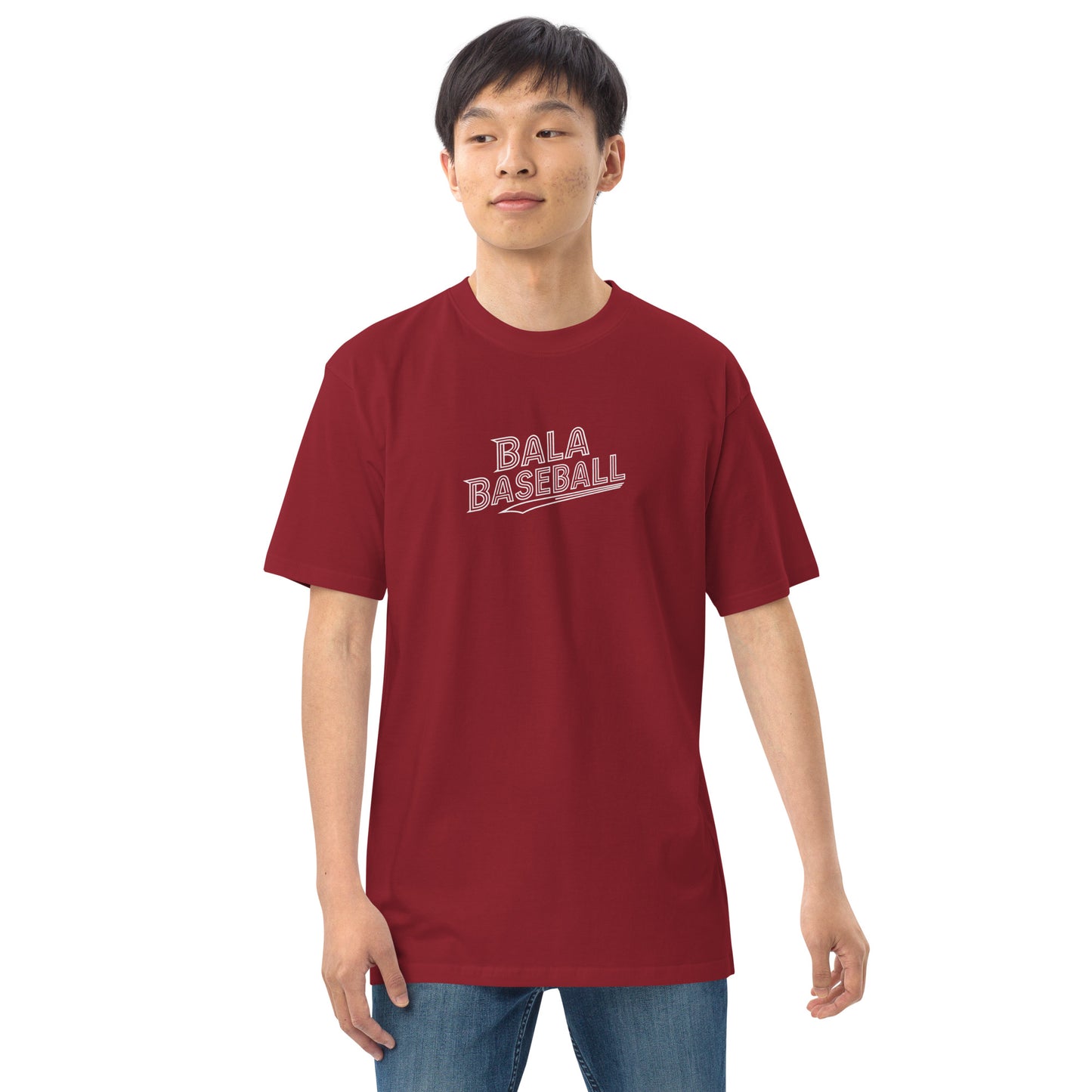 Man wearing a red Beast Mode Activated Men’s premium heavyweight baseball tee with Bala Baseball logo