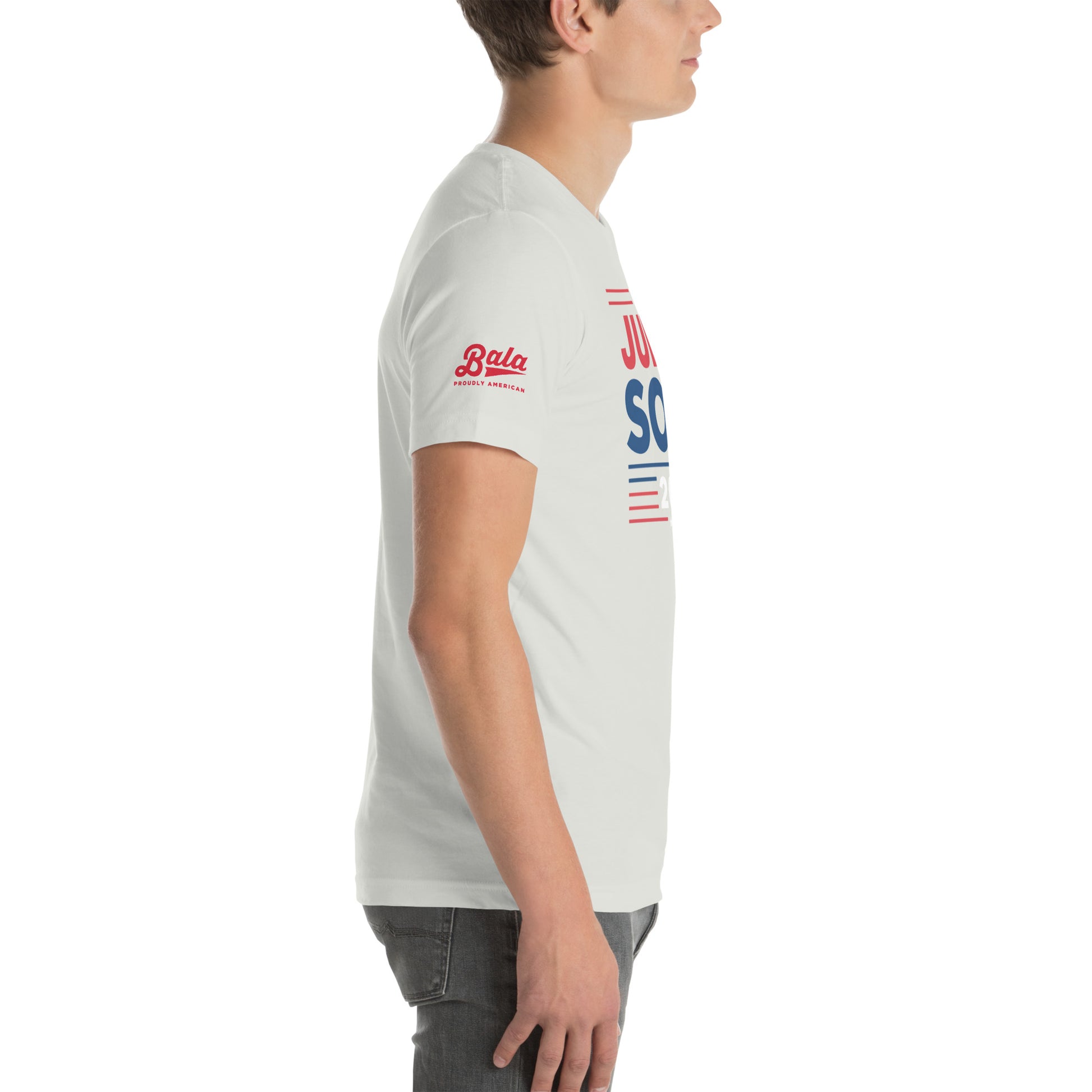 Person wearing Judge Soto Election unisex silver baseball t-shirt, side view, soft and lightweight with right amount of stretch.